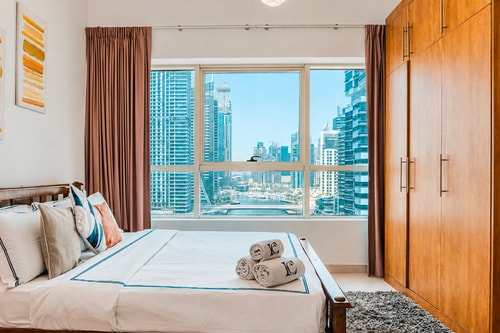 MVT - 1BR with Balcony & Stunning Marina View. 7 Vacation Homes