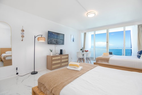 Beachfront Studio with Private Balcony & Parking