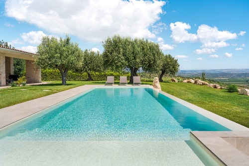 Villa Nivura, Minimalist Elegance Amid the Olive Groves 1 Villas in Italy