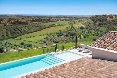 Villa Nivura, Minimalist Elegance Amid the Olive Groves 0 Villas in Italy