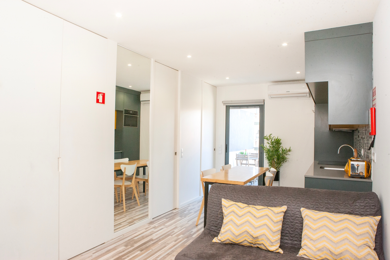 Twin Balcony Flats, Bold Yellow Style by HostWise 14 Host Wise Booking