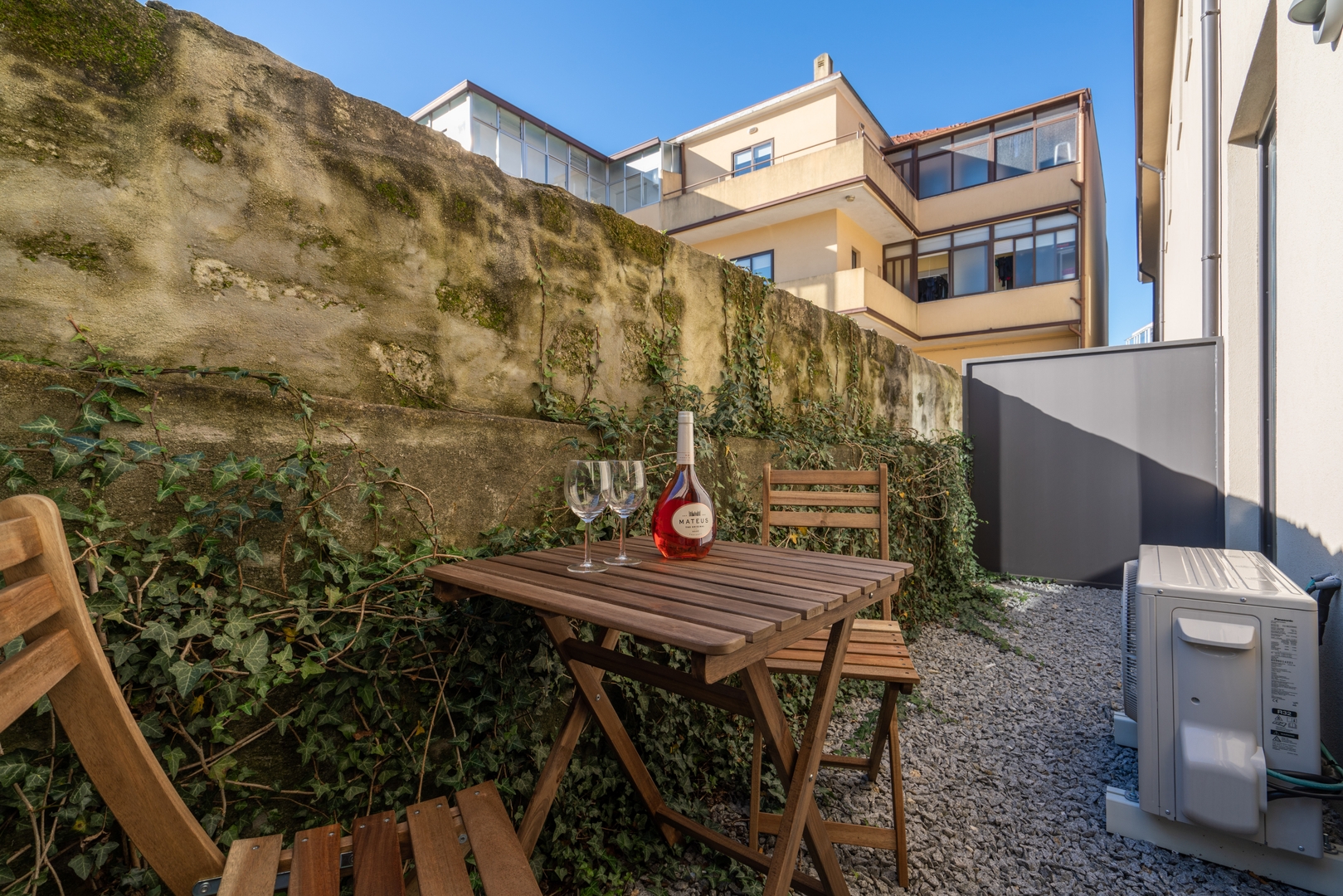 3 Cozy Flats with Private Patios by HostWise 10 Host Wise Booking