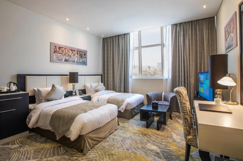 Deluxe King or Twin Room Near Al Nahyan Stadium 1 Luxury Bookings