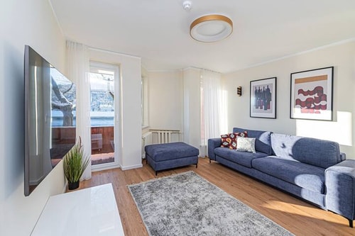 Riverfront 1BD Apartment by Domvia