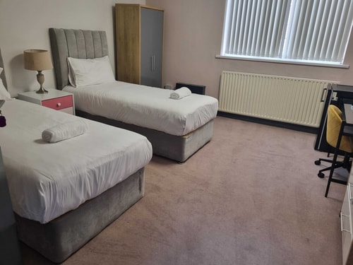 Shared room with two single beds
