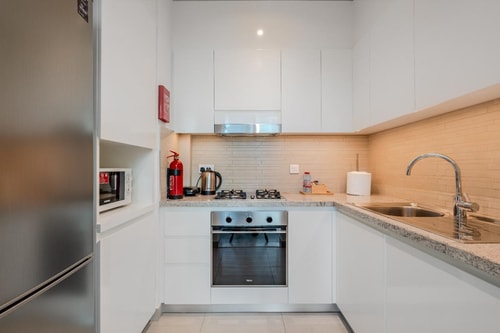 Stylish 1BR Steps from Dubai Mall | Skyline Views 3 Ultima Homes
