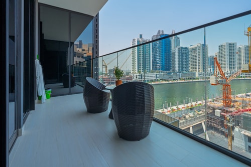 Canal-Front 1BR | Pool, Gym, Free Parking 4 Mi Casa Holiday Homes