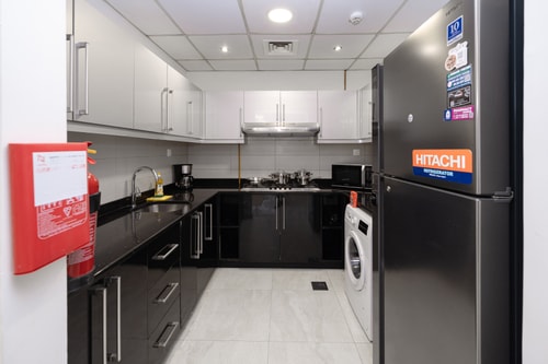Stylish 4BR with Jacuzzi, Sauna & Prime Amenities 5 Mi Casa Holiday Homes