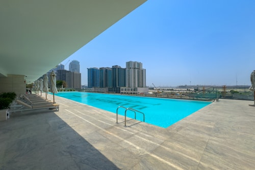 Canal-Front 1BR | Pool, Gym, Free Parking 23 Mi Casa Holiday Homes