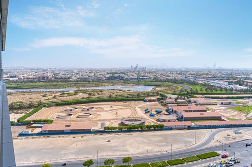 Canal View 1BR + Terrace Gym, Pool, Parking 18 Mi Casa Holiday Homes