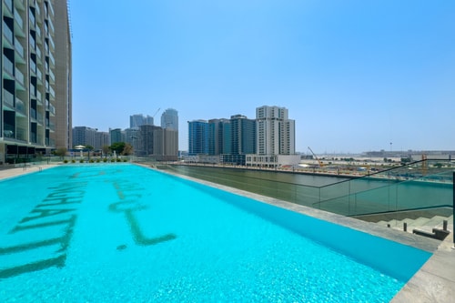 Canal-Front 1BR | Pool, Gym, Free Parking 24 Mi Casa Holiday Homes
