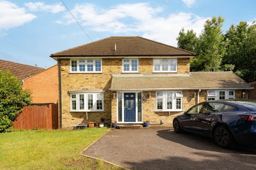 Spacious 4BR Home with Garden & Parking