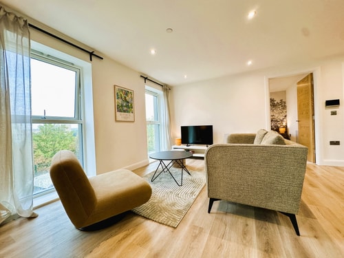 2BR Apartment with City Views & Parking